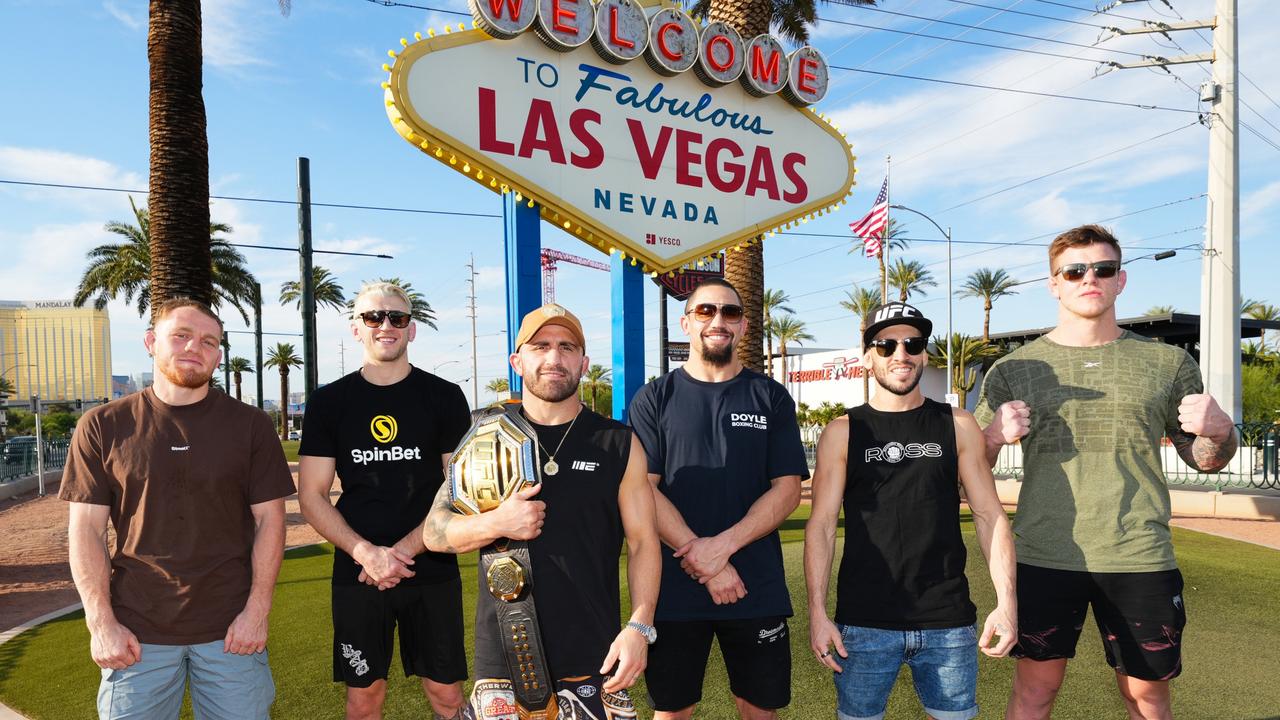 Jack Della Maddalena, Dan Hooker, Alexander Volkanovski, Robert Whittaker, Shannon Ross and Jimmy Crute pose in front of the Welcome to Fabulous Las Vegas sign during UFC International Fight Week on July 3, 2023 in Las Vegas, Nevada. (Photo by Chris Unger/Zuffa LLC)