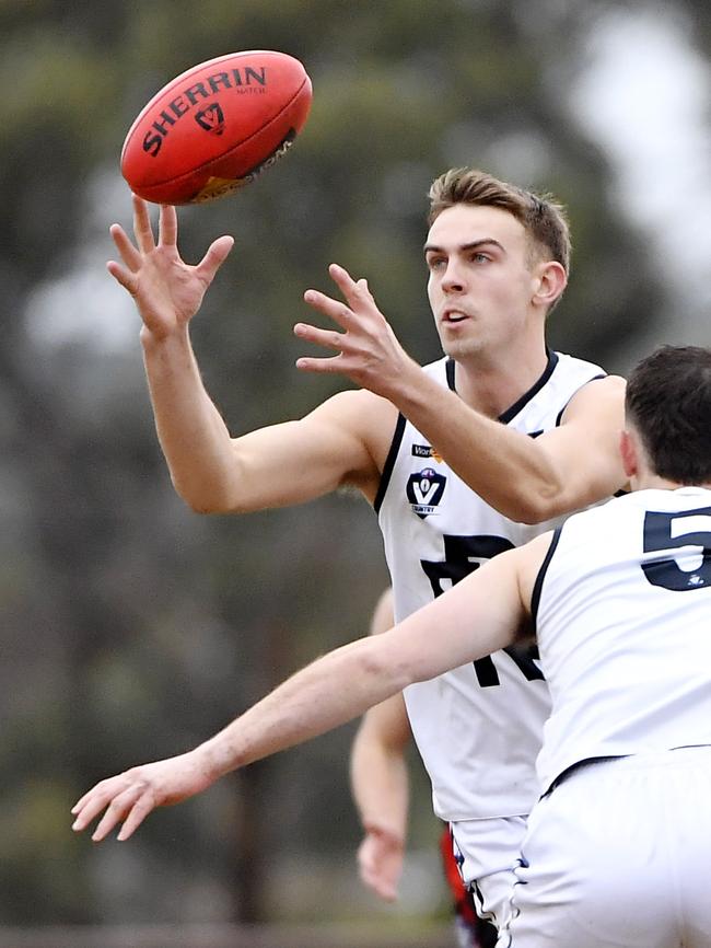 Will Gown with the ball for Rosebud. Picture: Andrew Batsch