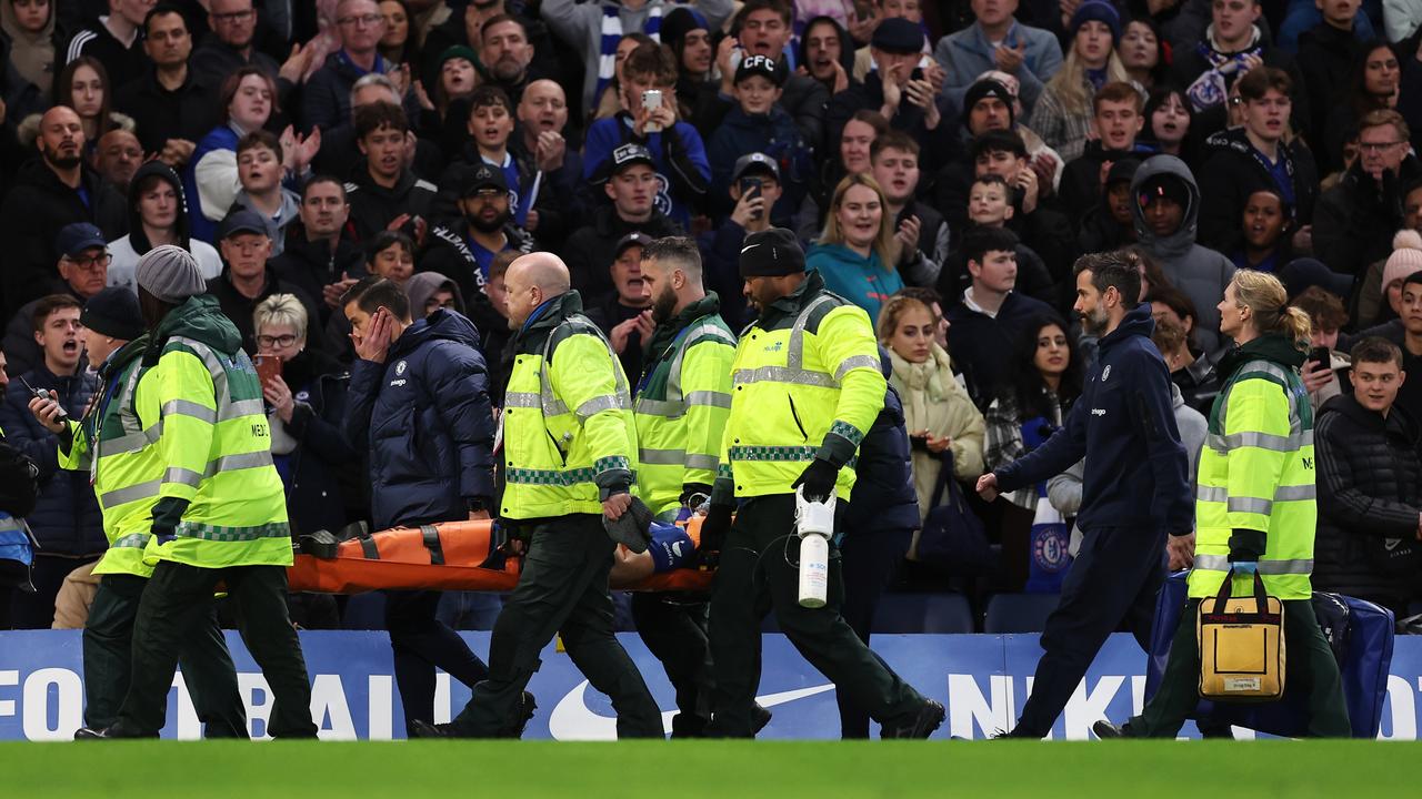 Cesar Azpilicueta of Chelsea is stretchered off. Photo by Julian Finney/Getty Images)