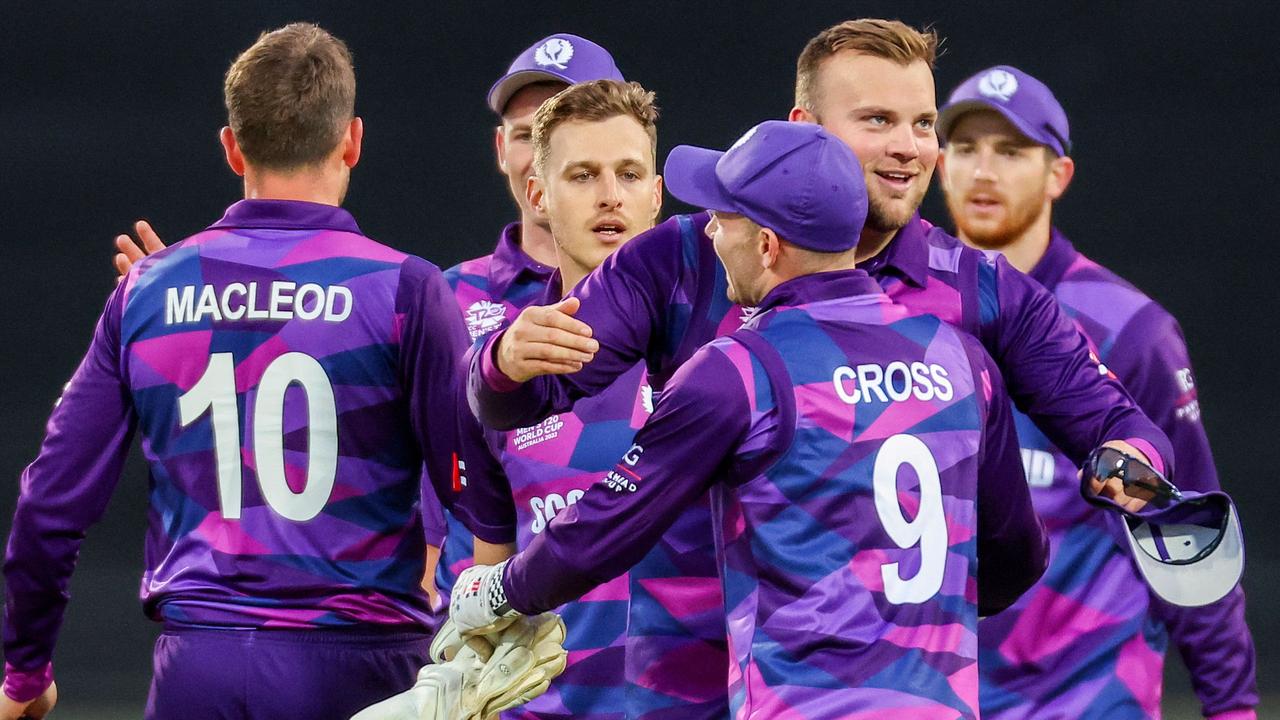 Scotland players celebrate their win against West Indies at Bellerive Oval. Picture: AFP