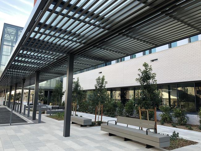 The exterior at the new Frenchs Forest’s hospital. Seating and plants are in place. Picture: Julie Cross