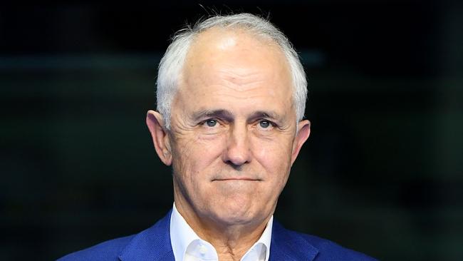 GOLD COAST, AUSTRALIA - APRIL 10:  Prime Minister of Australia Malcolm Turnbull applauds the Australian Men's 4 x 100m Medley Relay Final team winning gold on day six of the Gold Coast 2018 Commonwealth Games at Optus Aquatic Centre on April 10, 2018 on the Gold Coast, Australia.  (Photo by Quinn Rooney/Getty Images)