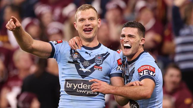 Tom Trbojevic and Nathan Cleary of the Blues celebrate after scoring a try during game one of the 2021 State of Origin series in Townsville.