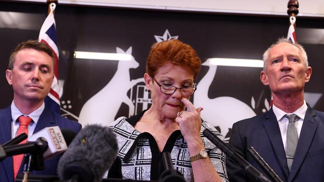 Hanson (centre) defended her right hand man James Ashby (left) and Steve Dickson after both were caught in an Al-Jazeera investigation which filmed them discussing donations from US gun lobbys. Picture: AAP