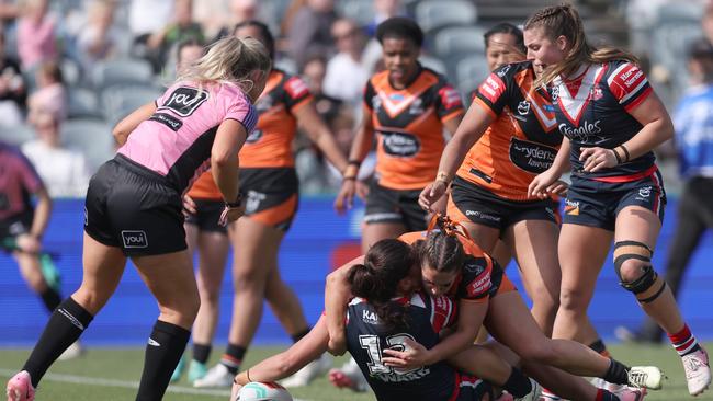 The Roosters scored three late tries to see off the Wests Tigers, with Jess Sergis recovering from a knee injury to grab the sealer. Picture: Scott Gardiner/Getty Images