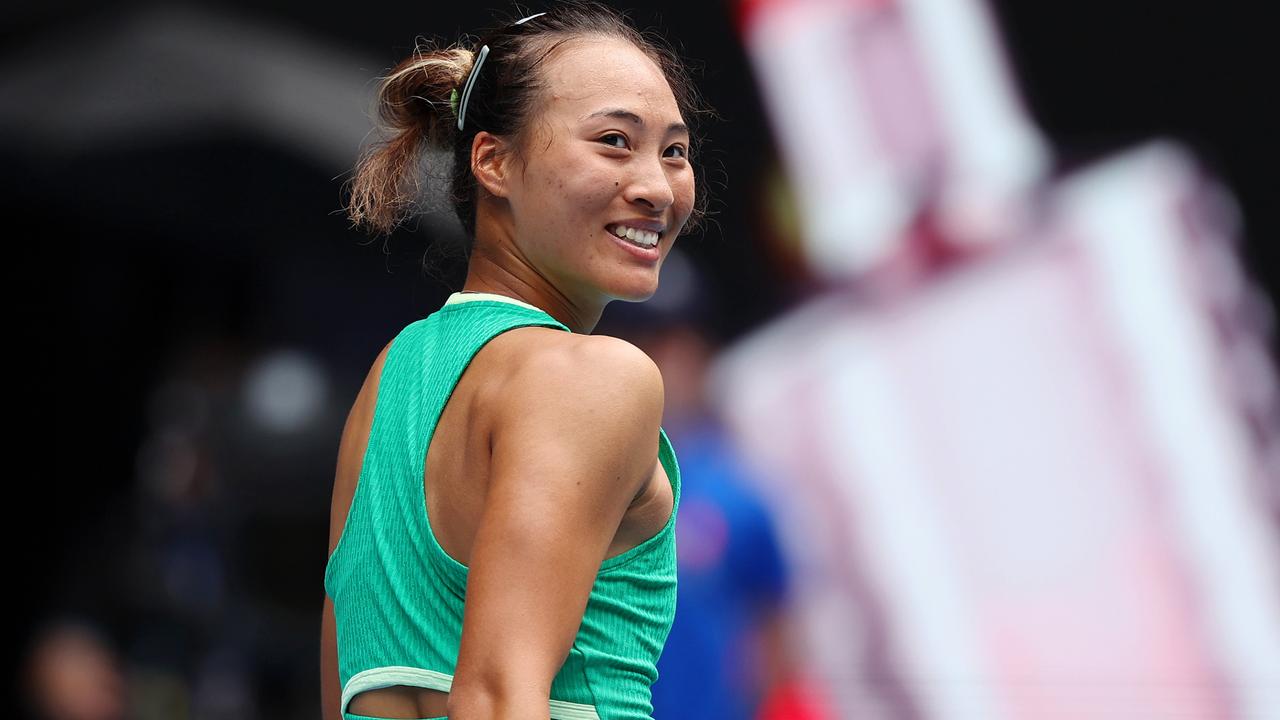 Zheng Qinwen celebrates match point in her round three victory over Wang Yafan. (Photo by Cameron Spencer/Getty Images)