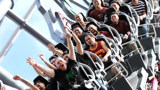 Leonard Hebert (front left) has ridden the DC Rivals hypercoaster 819 times. He's going for a record and is very well known with MovieWorld staff. Photo by Richard Gosling