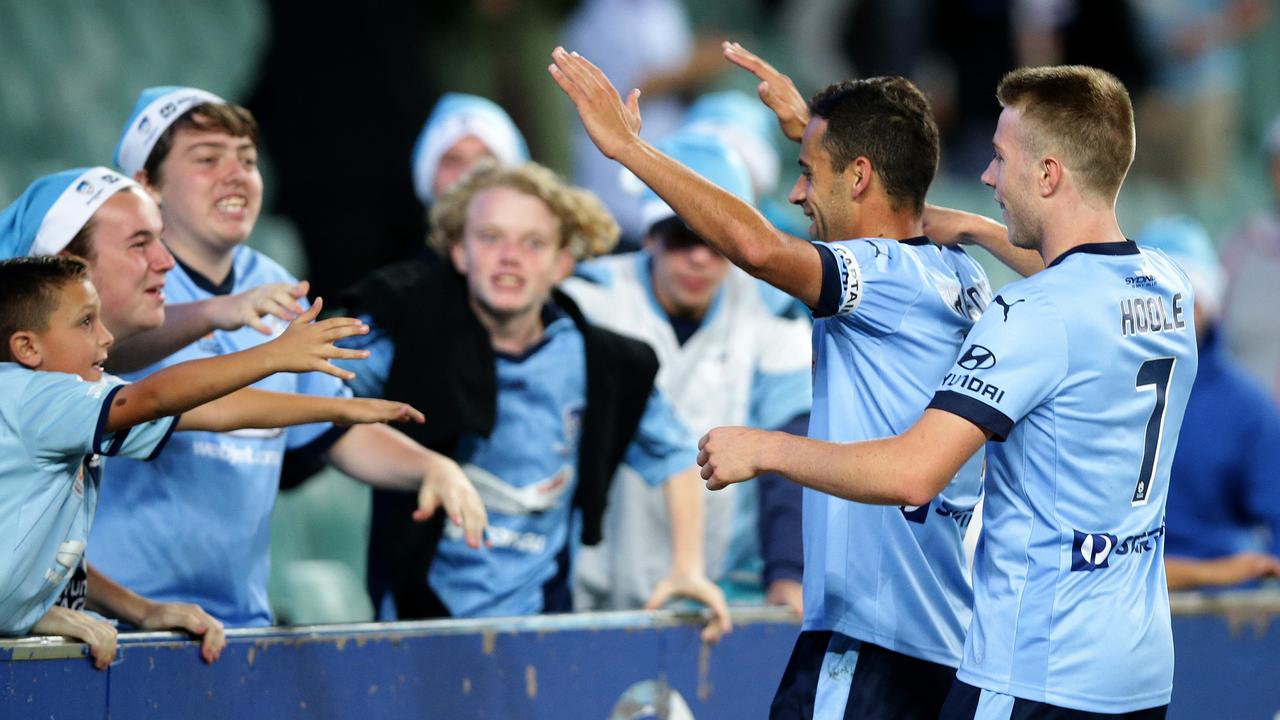 Sydney's Alex Brosque celebrates scoring a goal with the fans during the A League game between Sydney FC and the Newcastle Jets at Allianz Stadium,Moore Park.Picture Gregg Porteous
