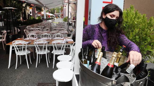 Preparations for New Year’s Eve in Flinders Lane, Melbourne, on Thursday. Picture: David Crosling