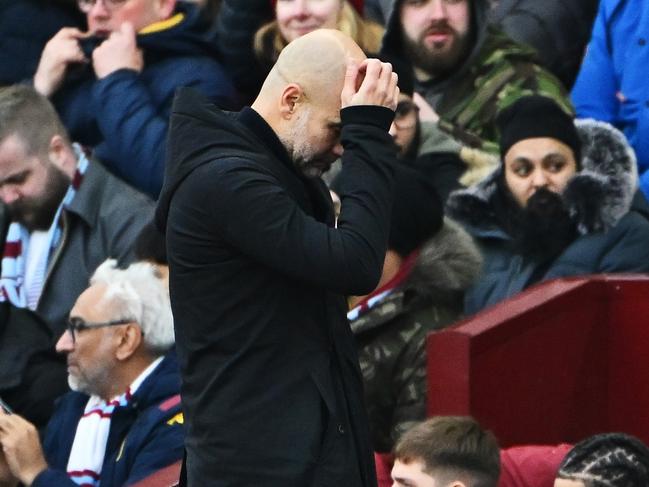 BIRMINGHAM, ENGLAND - DECEMBER 21: Pep Guardiola, Manager of Manchester City, reacts during the Premier League match between Aston Villa FC and Manchester City FC at Villa Park on December 21, 2024 in Birmingham, England. (Photo by Dan Mullan/Getty Images)