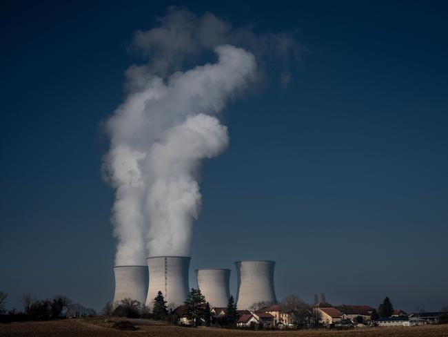 Smoke rising from the Bugey nuclear power plant in Saint-Vulbas, central eastern France. Despite drawing more of its power from nuclear than any other nation in Europe, power bills are about median for the continent. Picture: Jean-Philippe Kziazek/AFP