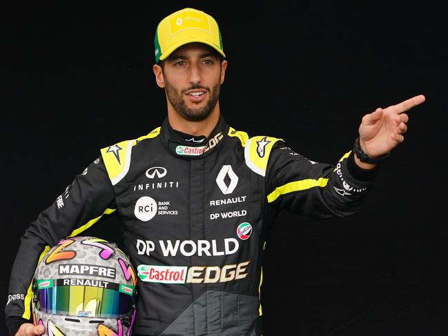 Daniel Ricciardo of Australia and Renault Sport F1 poses for a photo in the Paddock ahead of the Formula 1 Australian Grand Prix 2020 at the the Albert Park Circuit in Melbourne, Thursday, March 12, 2020. (AAP Image/Scott Barbour) NO ARCHIVING, EDITORIAL USE ONLY