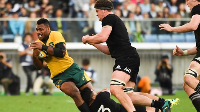 Australia's Samu Kerevi is tackled by All Black Anton Lienert-Brown during the Bledisloe Cup Test match between at Yokohama International Stadium in Japan in October. Picture: Toshifumi KITAMURA / AFP