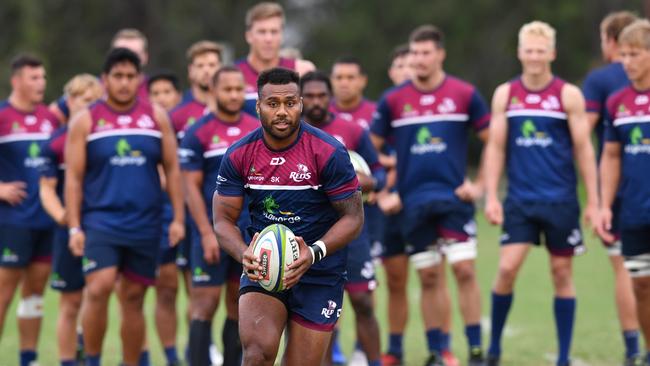 Samu Kerevi (centre) is seen during a Queensland Reds training session at Ballymore in Brisbane, Tuesday, May 14, 2019. The Reds are preparing for their Super Rugby match against the New South Wales Waratahs on Saturday at Suncorp Stadium. (AAP Image/Darren England) NO ARCHIVING