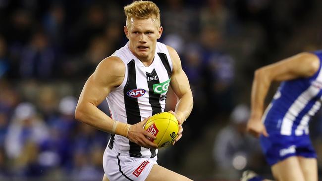 Adam Treloar in action for the Magpies. Picture: Michael Klein