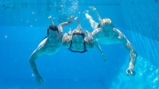 Nova's Ash (left), Luttsy (right) &amp; Susie O’Neill (centre) will fly to Japan in August to compete in the 50m mixed relay at the 2023 Aquatic Masters and need a fourth to complete their team. Photo: Luke Marsden.