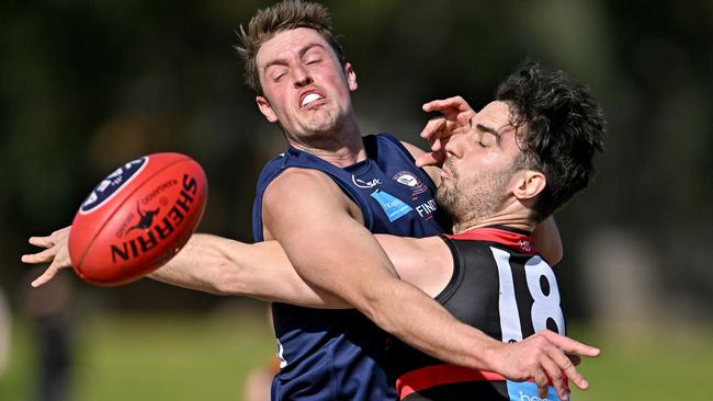 VAFA: Old Melburnian’s Nick De Steiger battles Xavier Richards of Old Xaverians. Picture: Andy Brownbill