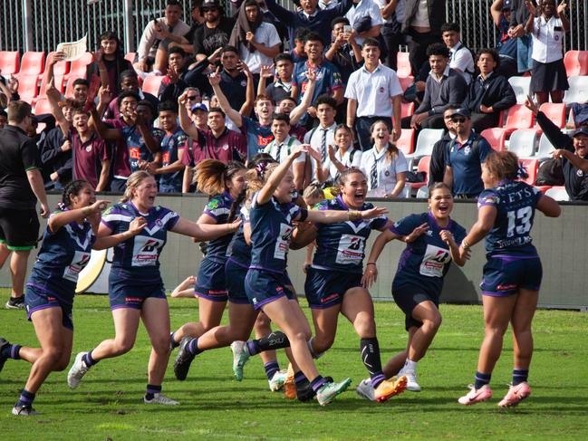 Ipswich State High celebrate after Shalom Sauaso scored the match-winning try in the southeast Queensland final. Picture: Milahn Situa