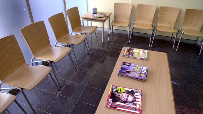 22 Mar 2001 Inside Kings Cross medical supervised injecting room at 66 Darlinghurst Rd Kings Cross . The Waiting room in reception. picNathan/Edwards buildings interior drugs chairs table magazines