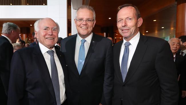 Former prime ministers John Howard, left, and Tony Abbott, right, with Prime Minister Scott Morrison at the official opening of the 46th Federal Parliament. Picture: Kym Smith