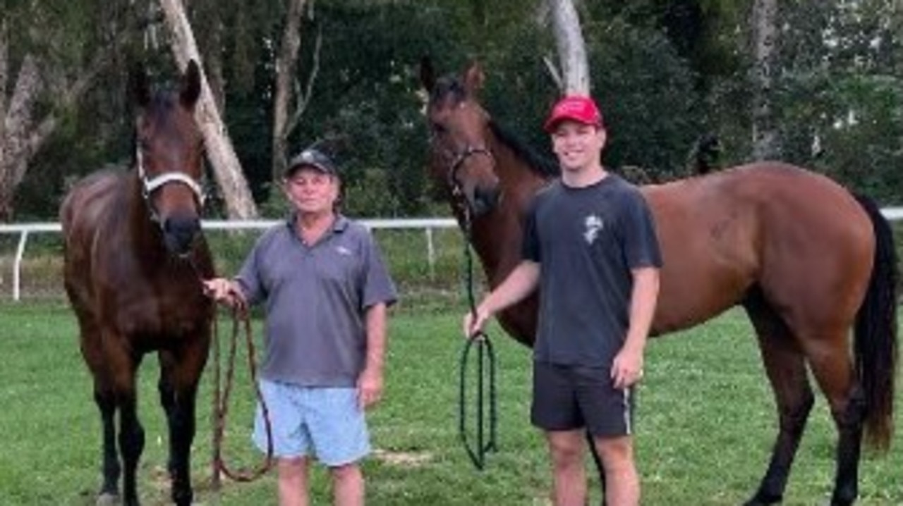 Brisbane-bound trainer Fred Smith (Mocambo) and training son Tom Smith with Bayerische after trackwork at Callaghan Park on Wednesday morning. Photo: Contributed