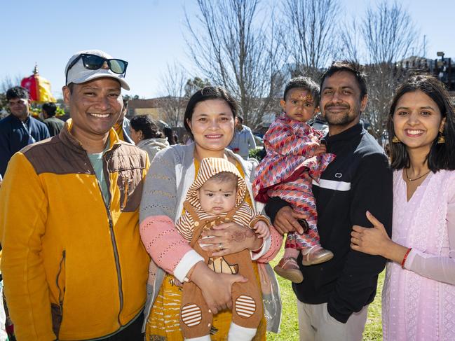 At Toowoomba's Festival of Chariots are (from left) Raju Shrestha, Asmita Shrestha holding Rihansh Shrestha, Bikash Poudel holding Saadhvi Poudel and Santoshi Dhungana, Saturday, July 20, 2024. Picture: Kevin Farmer