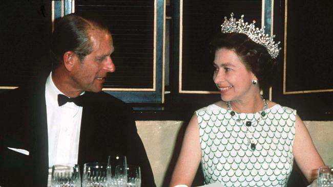 Queen Elizabeth II and Prince Philip, the Duke of Edinburgh at a State banquet in 1970. (Photo by Anwar Hussein/Getty Images)