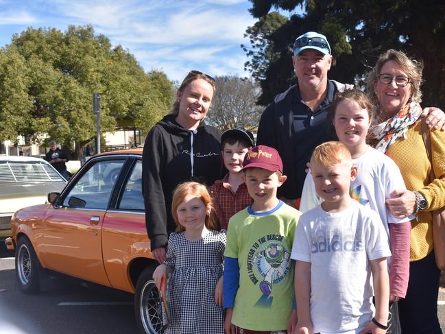 (back) Lou Gwynne, Wayne and Lisa Fitzgerald, (middle) Jack and Claire Fitzgerald, (front) Maddy Gwynne, Angus Fitzgerald, and Mitchell Gwynne at the Jumpers and Jazz Grand Automobile Show on July 18, 2021.