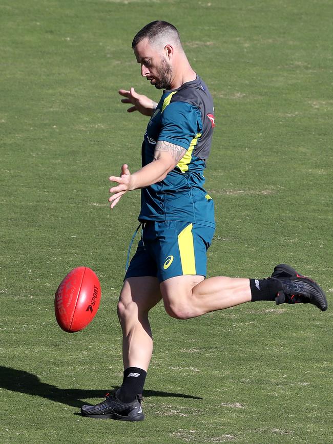 Matthew Wade gets in some footy practice in Adelaide while in quarantine with the Australian cricket team after their UK tour. Picture: Sarah Reed