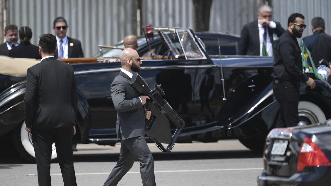 Security agents were spotted carrying DroneShield’s huge anti-drone weapons as they flanked the new Brazilian President Lula. Picture: Carl de Souza/AFP