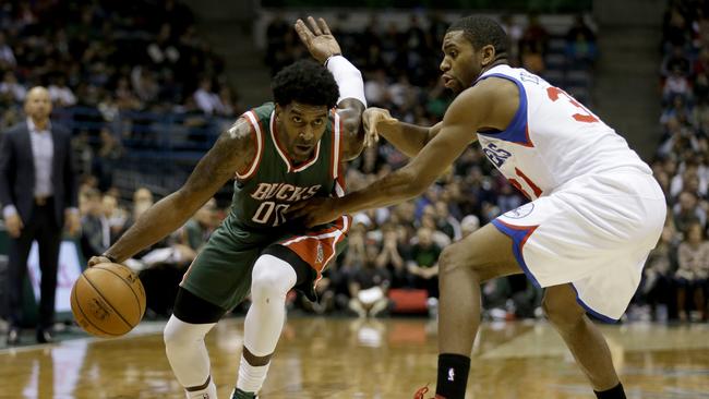 O.J. Mayo drives to the hoop during the second half against the Philadelphia 76ers.