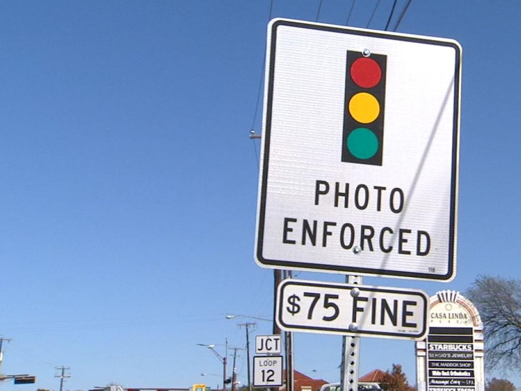 Texas red light cameras State bans intersection fines The Courier Mail