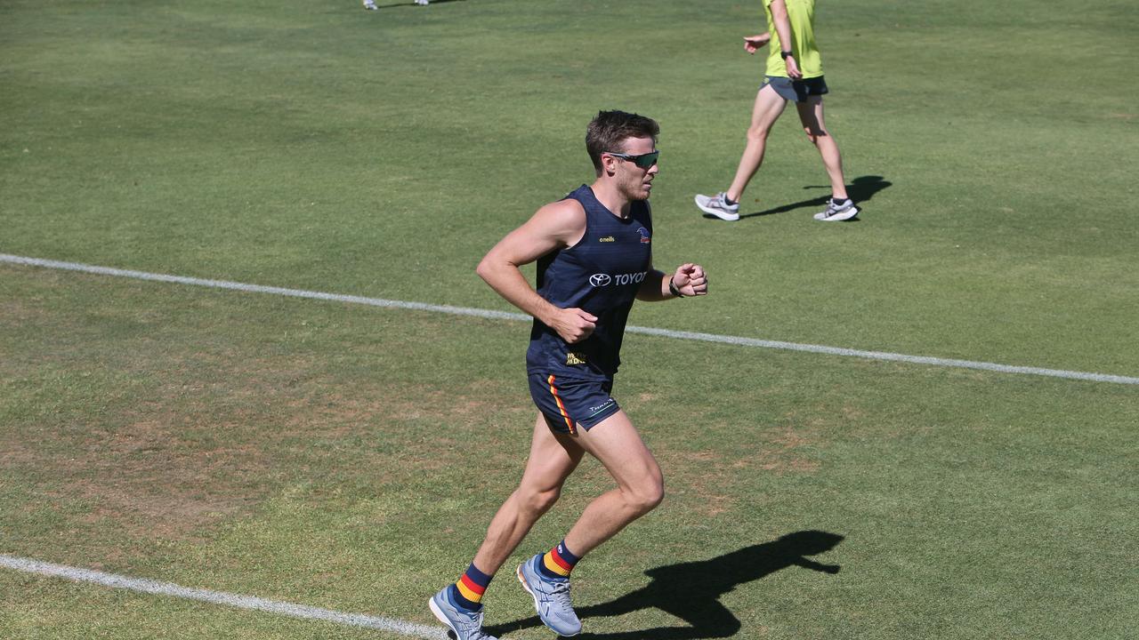 Paul Seedsman runs laps at training in sunglasses in February. Picture Emma Brasier