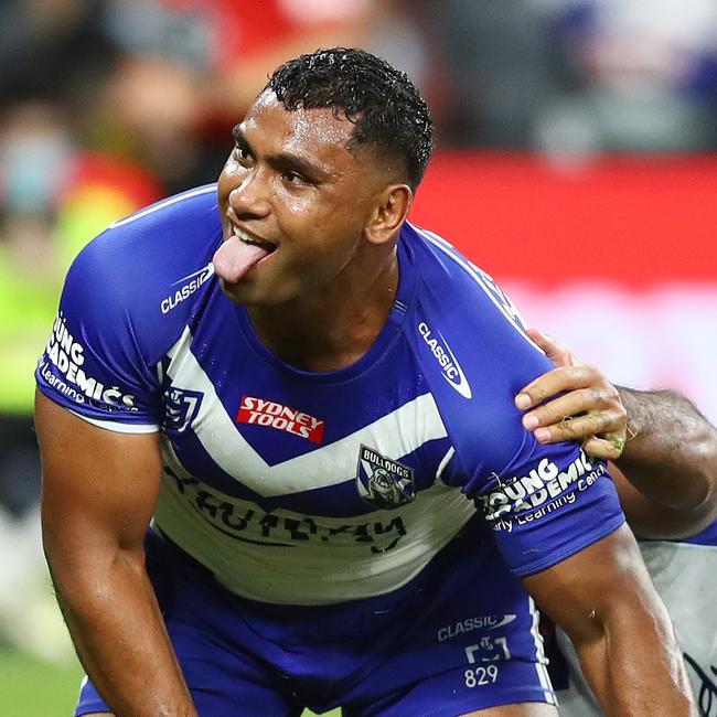 Tevita Pangai Jr celebrates a try for the Bulldogs.