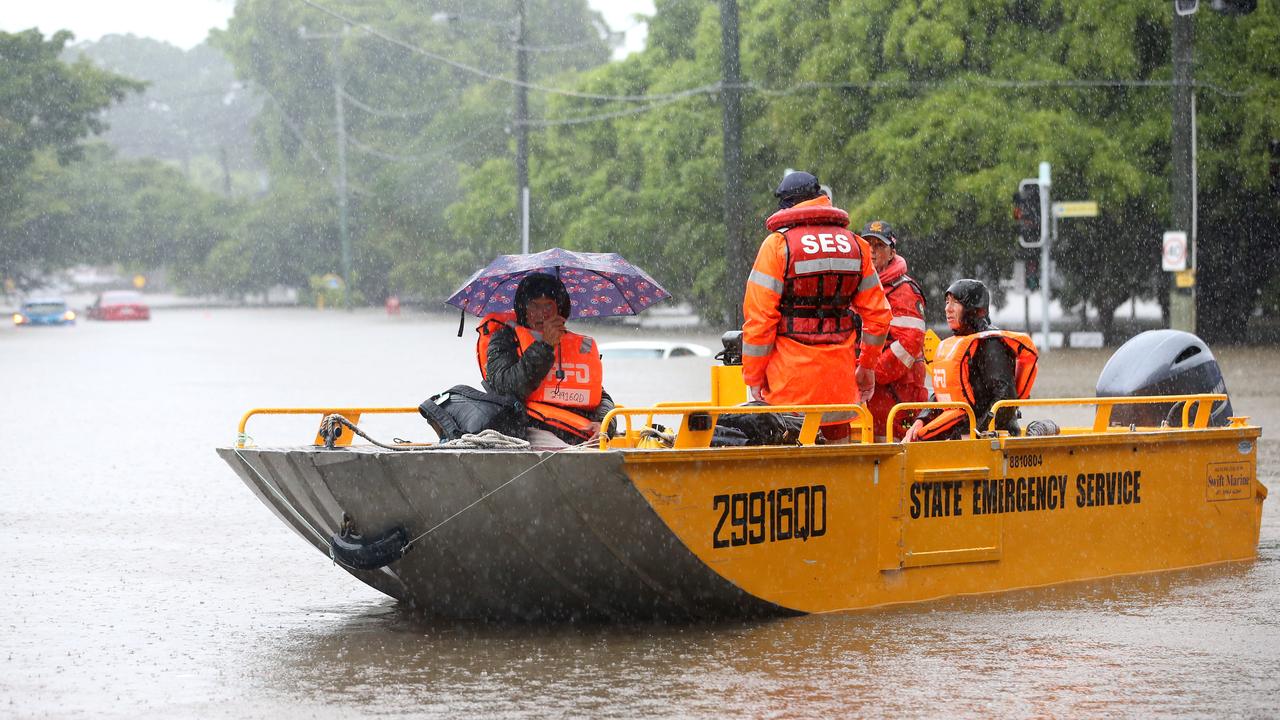 Lisa Camus deputy group leader SES (right) and Paul Cantarella during a rescue in Brisbane on Sunday. Picture: Steve Pohlner