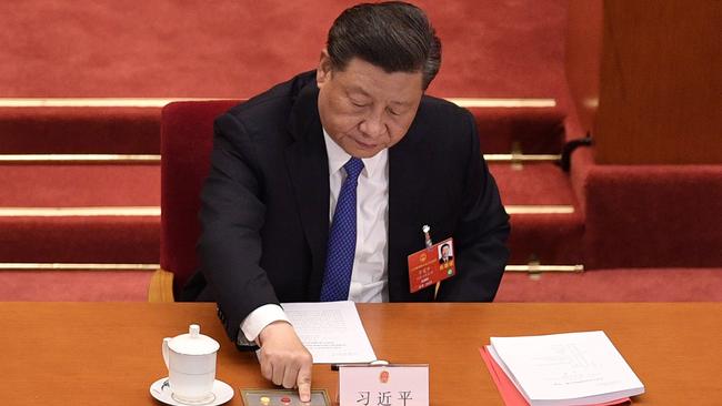 Xi Jinping votes on a proposal to draft a security law on Hong Kong. Picture: AFP.