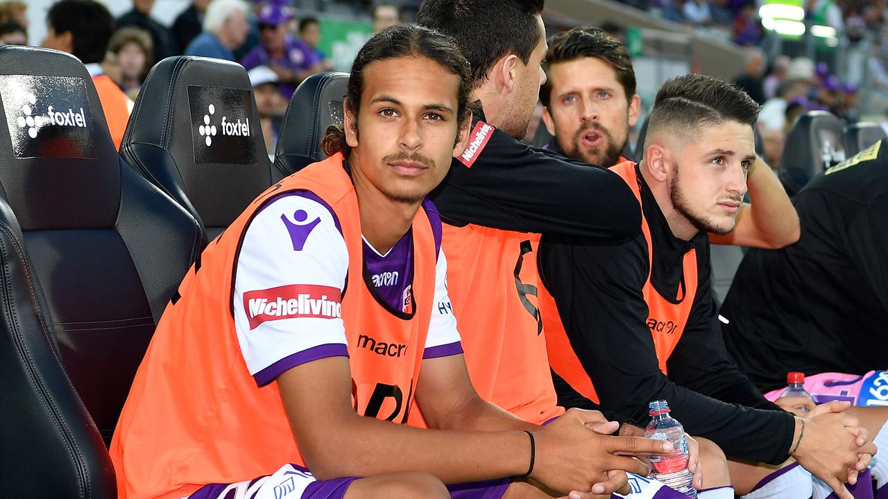Riley Warland of the Glory sits on the bench during the round 11 A-League match between the Perth Glory and the Wellington Phoenix