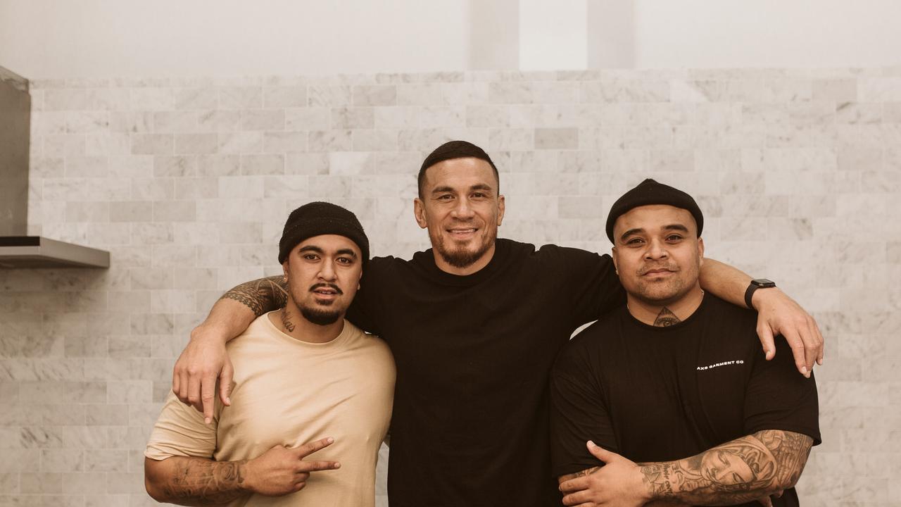 Sonny Bill Williams with the photographer of his autobiography, Mona Seiuli (left) and photographic assistant Gusi Brown (right).