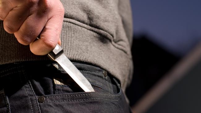 A student was threatened by a knife-wielding parent, according to the report.