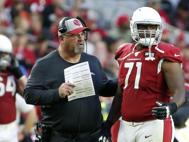 GLENDALE, ARIZONA - DECEMBER 15: Offensive lineman Justin Murray #71 of the Arizona Cardinals with offensive line coach Sean Kugler during the second half of the NFL football game against the Cleveland Browns at State Farm Stadium on December 15, 2019 in Glendale, Arizona. (Photo by Ralph Freso/Getty Images)