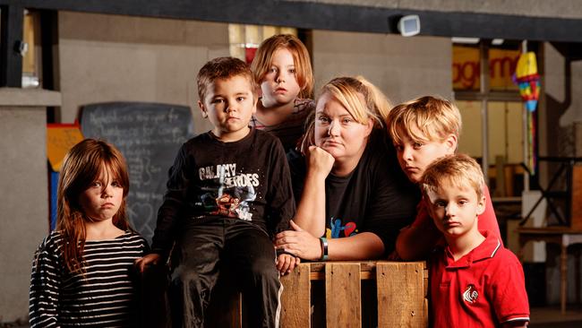 Puddle Jumpers chief executive Melanie Tate with Paulina, 9, Morrico, 6, Lisa, 7, Max, 10, and Oscar, 8. The charity has lost a court battle with the Le Cornu family to remain at its Forestville headquarters.