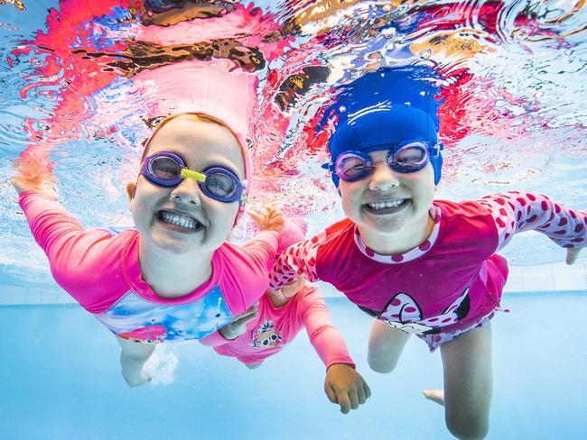 Story is on schools getting kids into swimming lessons following Courier-Mail campaign.L-R: Earnshaw State College preps Mikayla Atkinson, Bianca Willis and Elenor Smith.Picture: NIGEL HALLETT