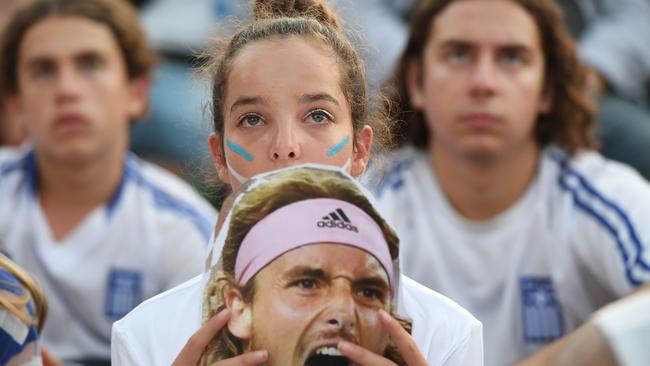 Sinking feeling: Greek fans react as Rafael Nadal streaks ahead of Stefanos Tsitsipas. Picture: Lukas Coch/AAP