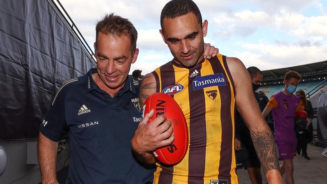 Alastair Clarkson, outgoing senior coach of Hawthorn and retiring star Shaun Burgoyne walk off the MCG together after the round 23 AFL match between the Richmond and Hawthorn at the MCG, on August 20, 2021, in Melbourne, Australia. (Photo by Michael Klein)