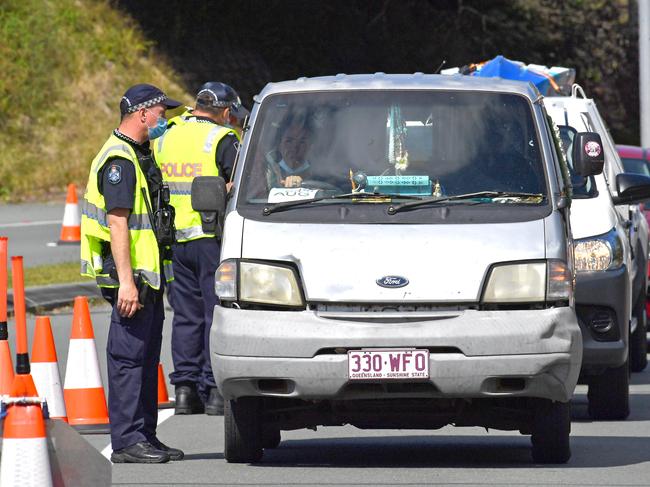 Police patrol the Queensland border to NSW as the northern state continues to impose a harsh border closure due to the Covid-19 outbreak in Sydney Picture: John Gass