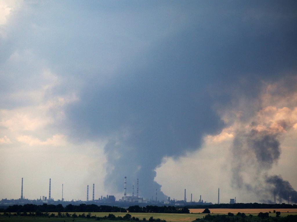 Smoke billows over the oil refinery outside the town of Lysychansk amid Russia's military invasion launched on Ukraine. Moscow claims to have taken the city. Picture: AFP