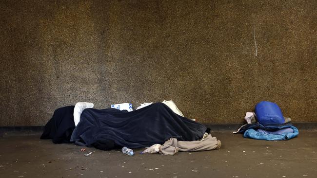 A rough sleeper in an underground Hyde Park walkway. Picture: Richard Dobson