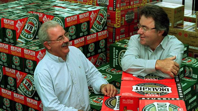 Adrian Saturno with brother Leon, celebrating the sale of their Booze Brothers retail liquor chain shops to Woolworths in March 2000.