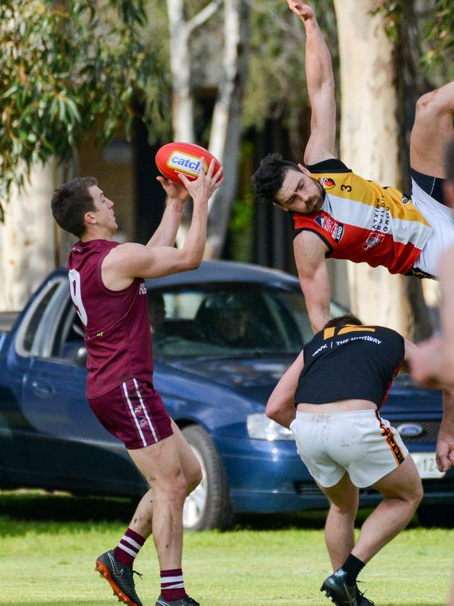 Trengove takes a mark at the back of the pack for the Reds. Picture: Brenton Edwards