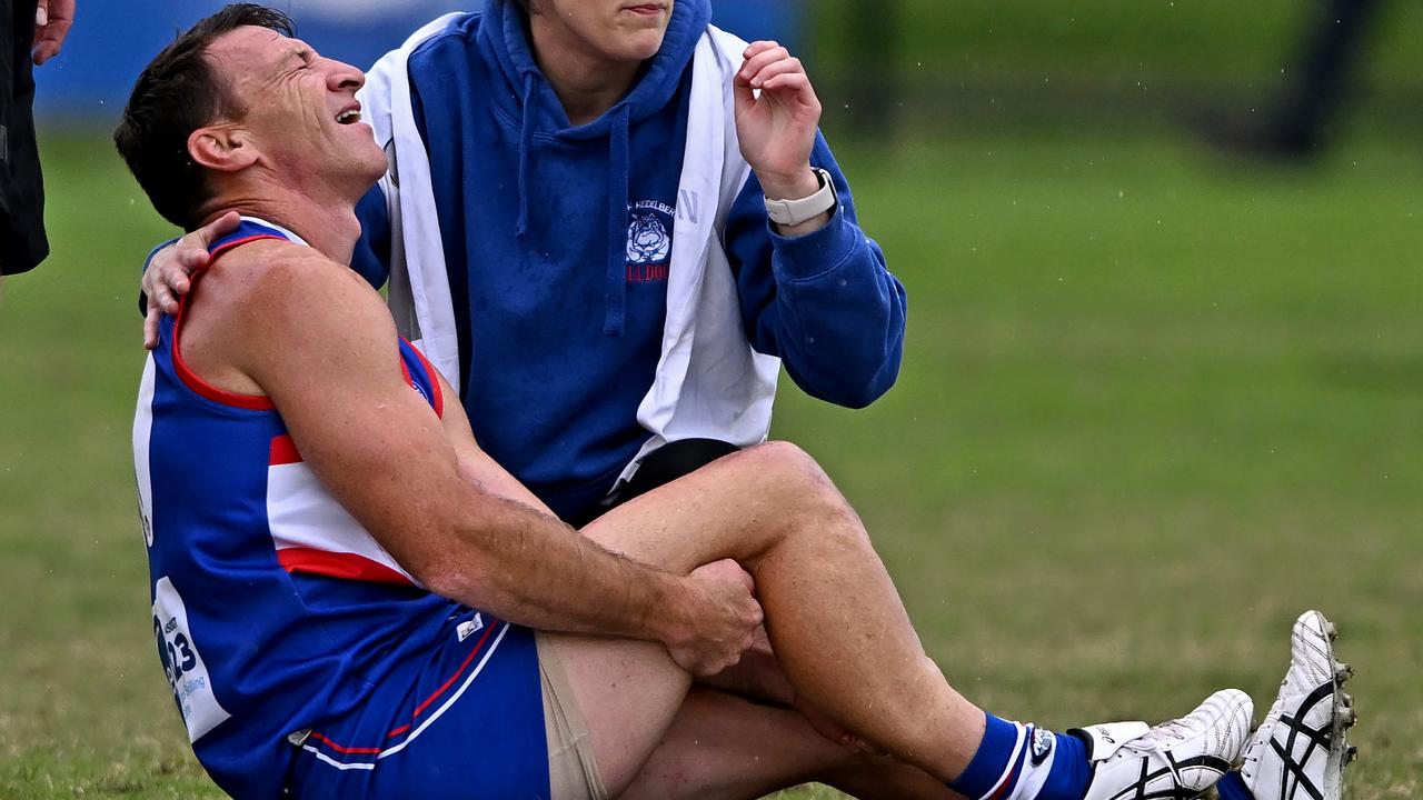 AFL icon Brent Harvey rushed to hospital with sickening injury